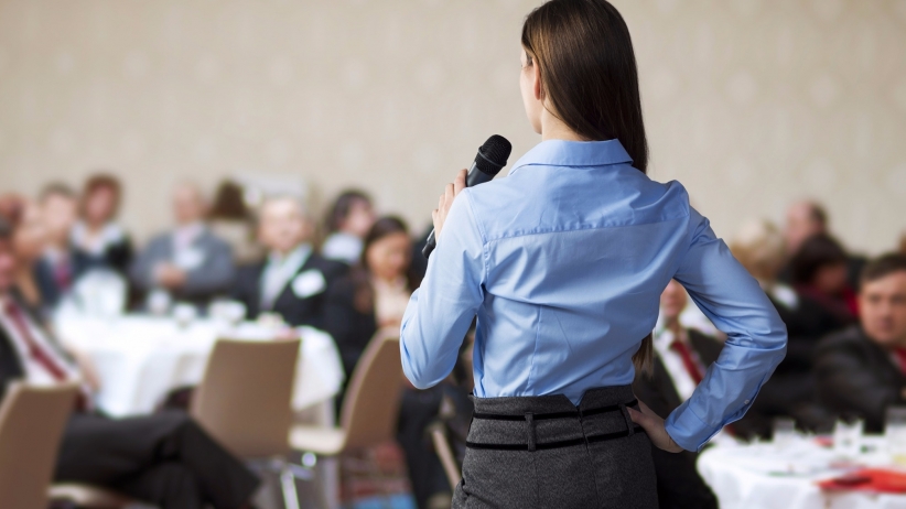 20150720143913-woman-speaking-conference-crowd